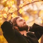 Portrait,Of,Young,Handsome,Bearded,Guy,In,The,Autumn,City